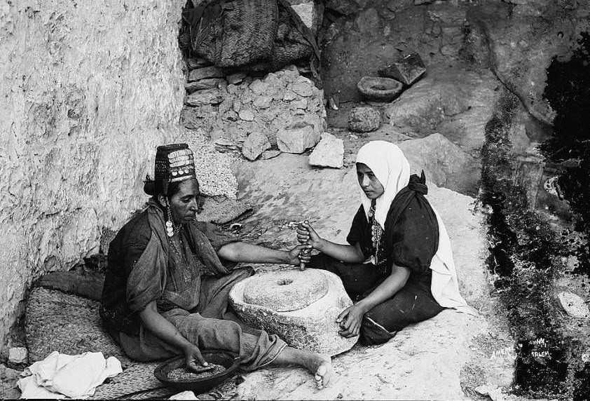 Two women working at a mill, Circa 1898-1914