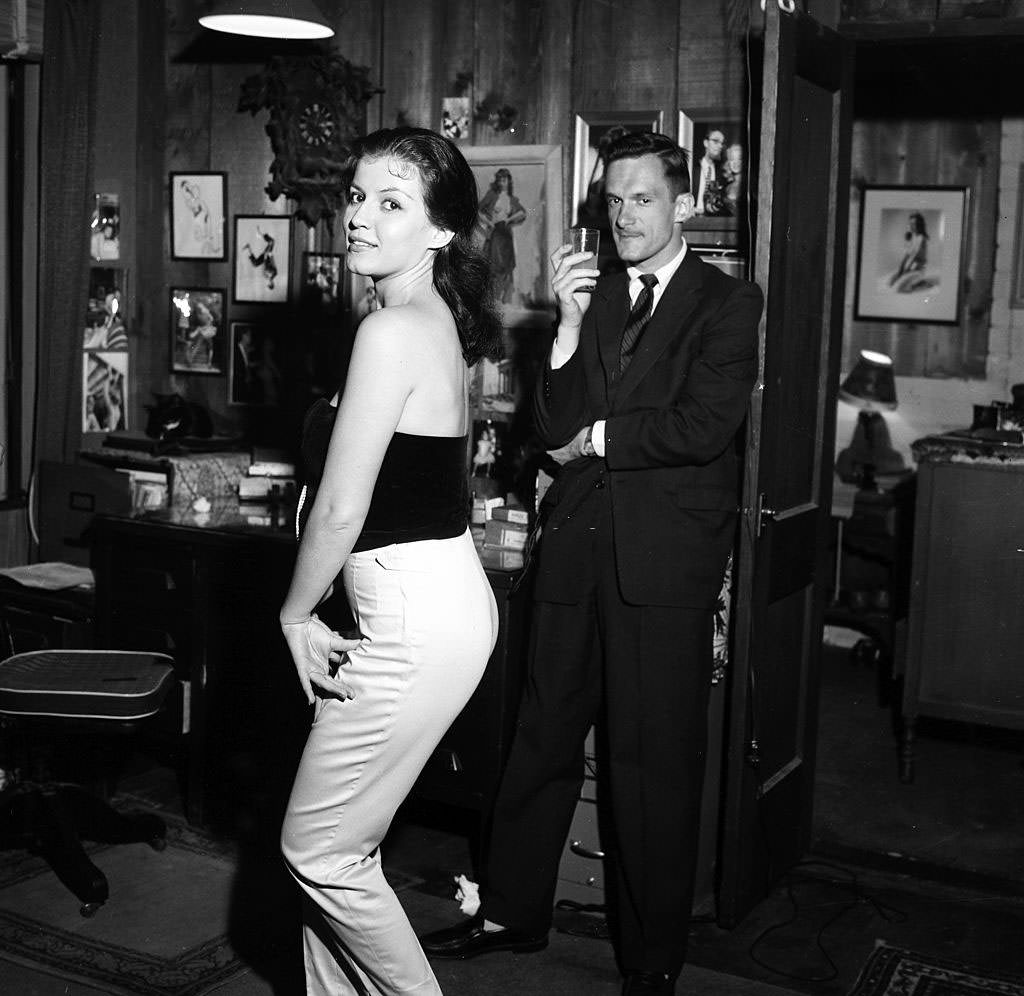 Joan Bradshaw posing with Hugh Hefner, 1957