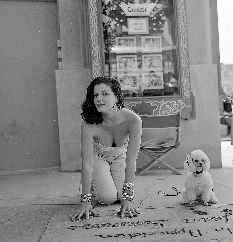 Joan Bradshaw with her dog, Los Angeles, 1957