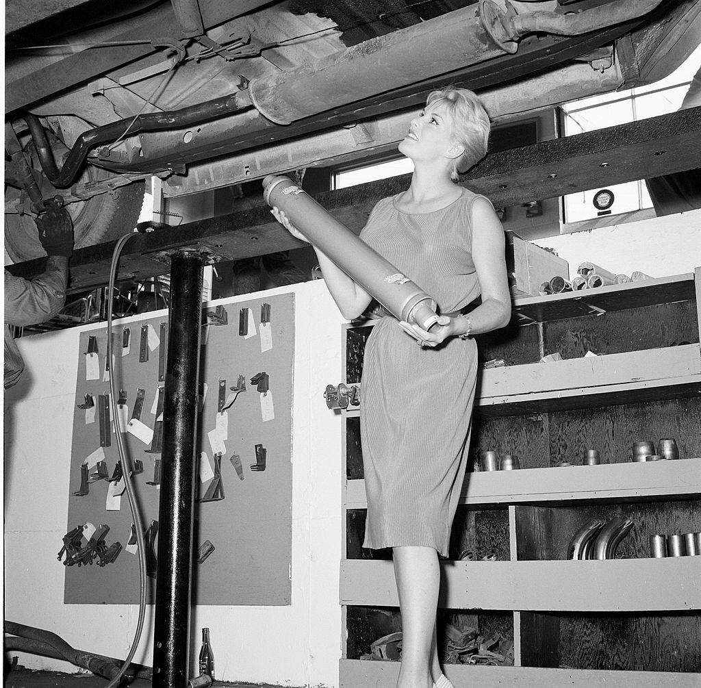 June Wilkinson posing for a promotional shoot for Muffler, 1959