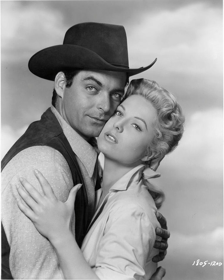 Martha Hyer with Rory Calhoun in the film 'Red Sundown', 1956