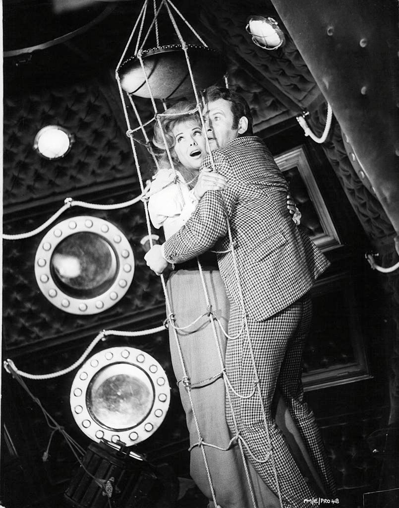 Martha Hyer with Edward Judd in a scene from the film 'First Men In The Moon', 1964