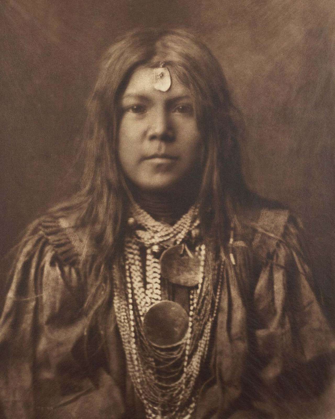 A young member of the Apache tribe. 1910.