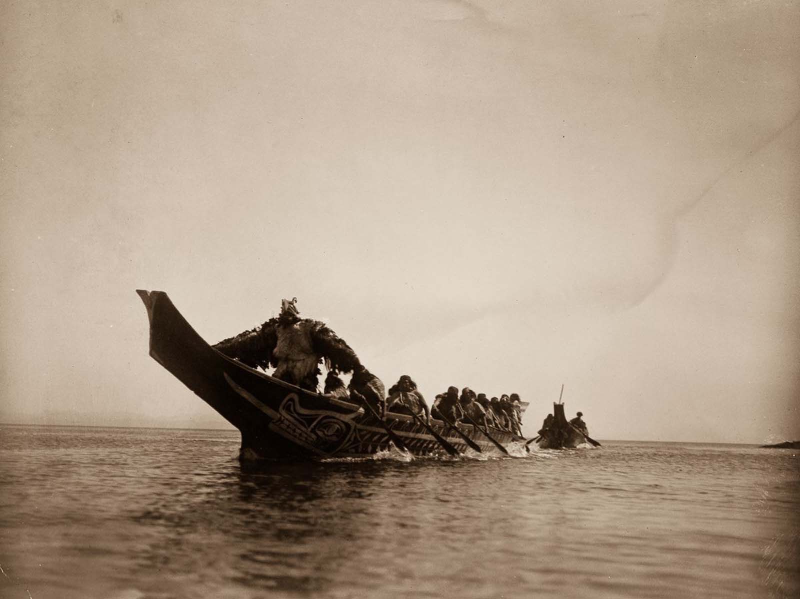 Kwakiutl people in canoes in British Columbia. 1914.
