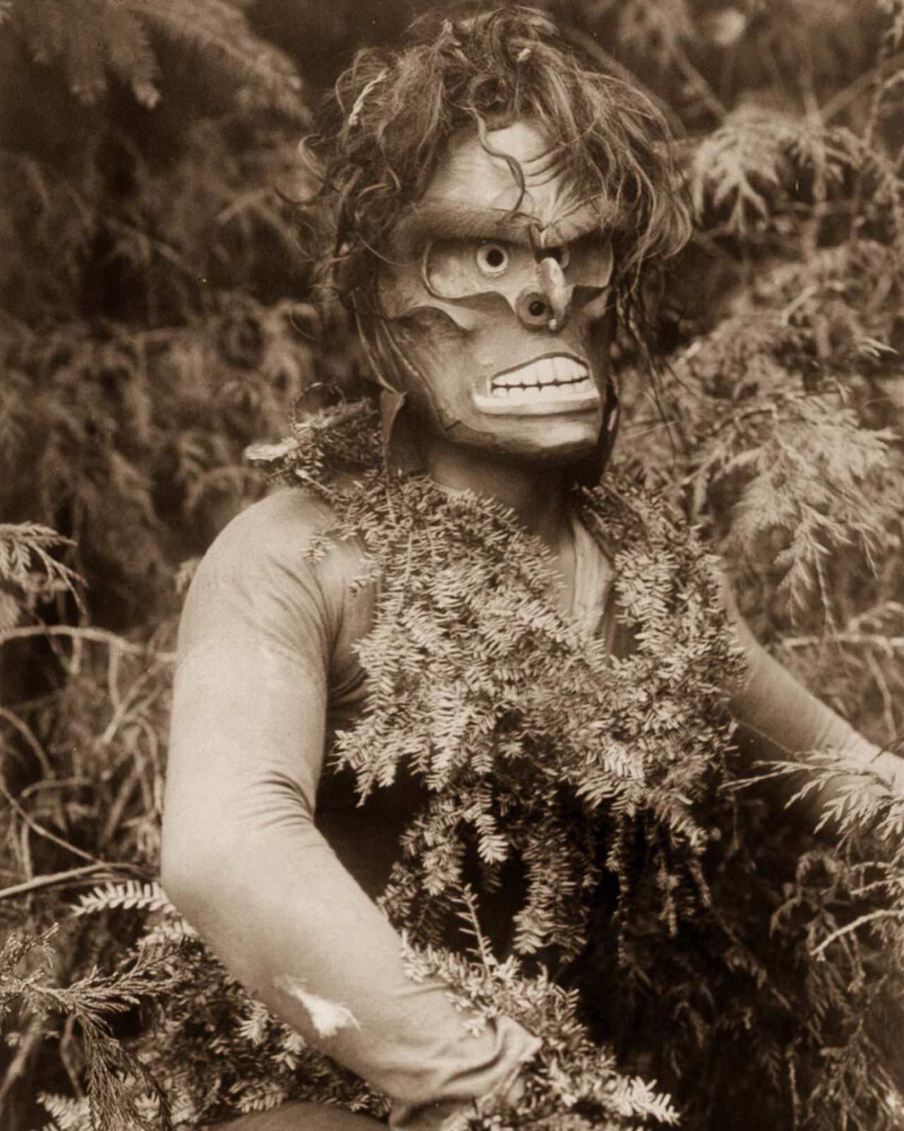 A Qagyuhl dancer dressed as Paqusilahl (“man of the ground embodiment”). 1914.