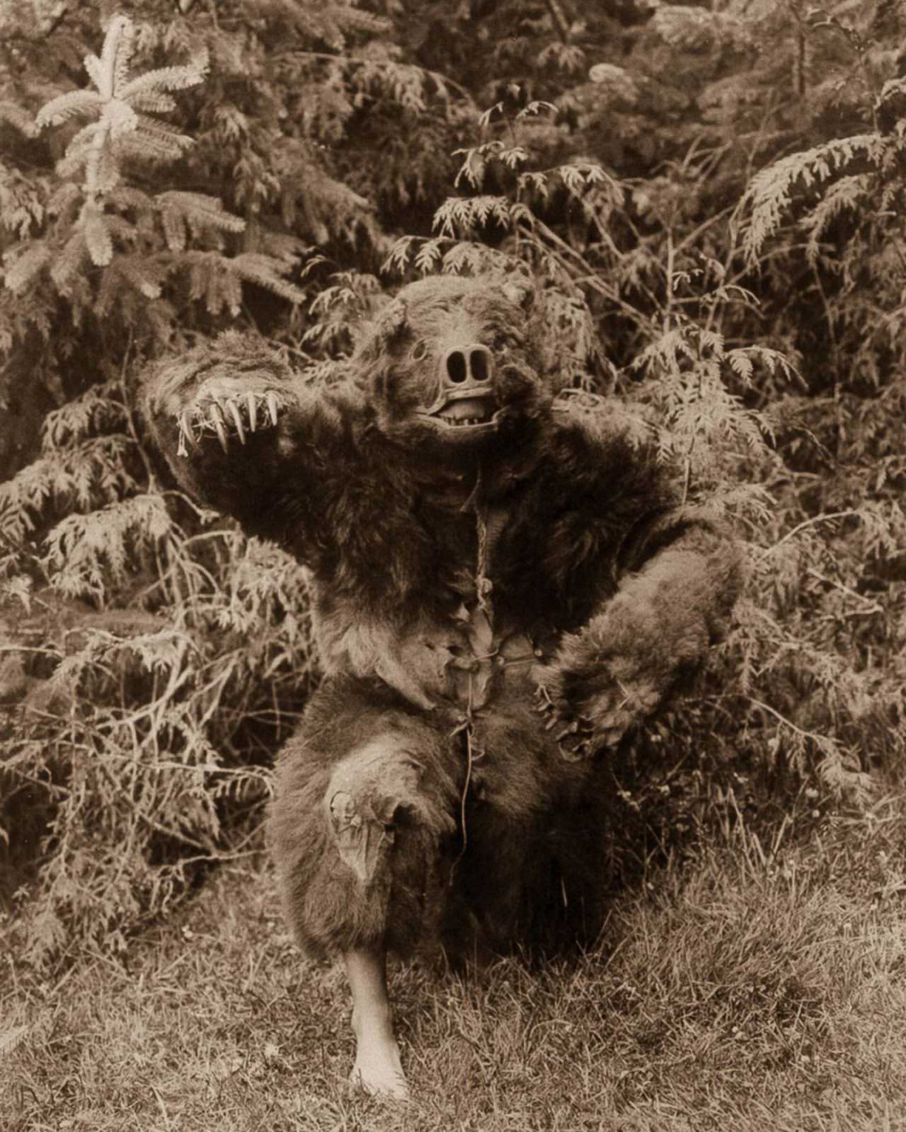 A Qagyuhl man dressed as a bear.