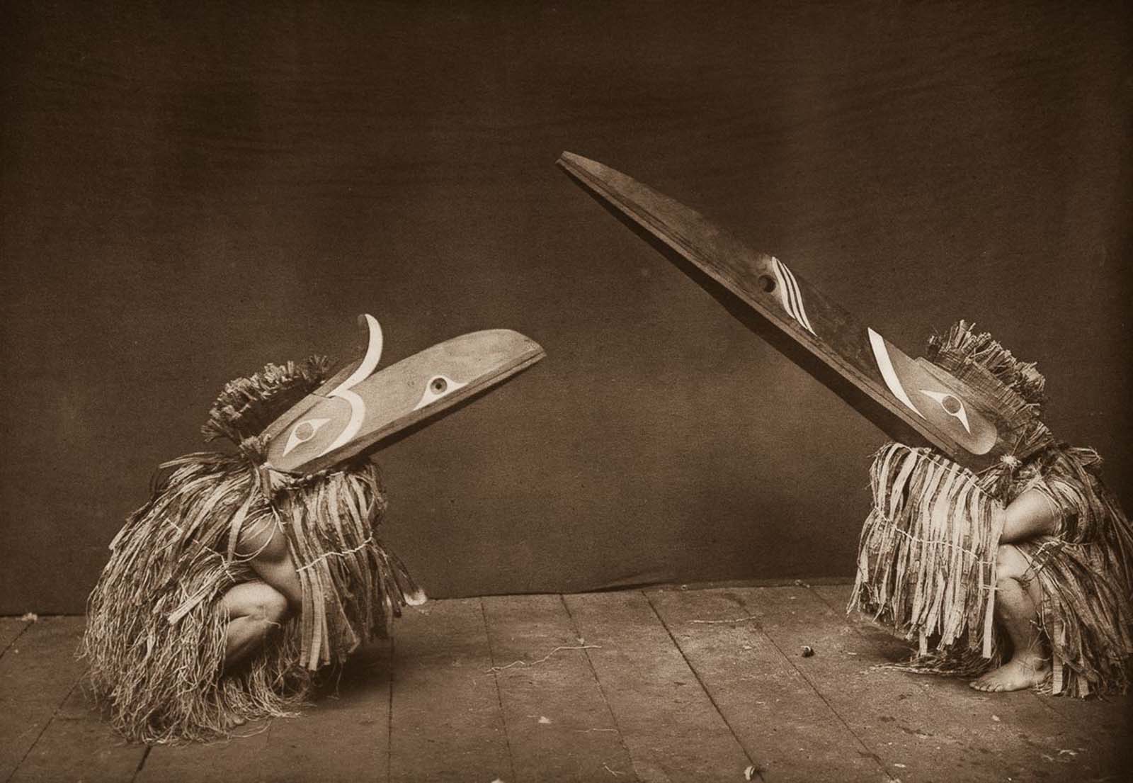 Nakoaktok dancers wear Hamatsa masks in a ritual. 1914.