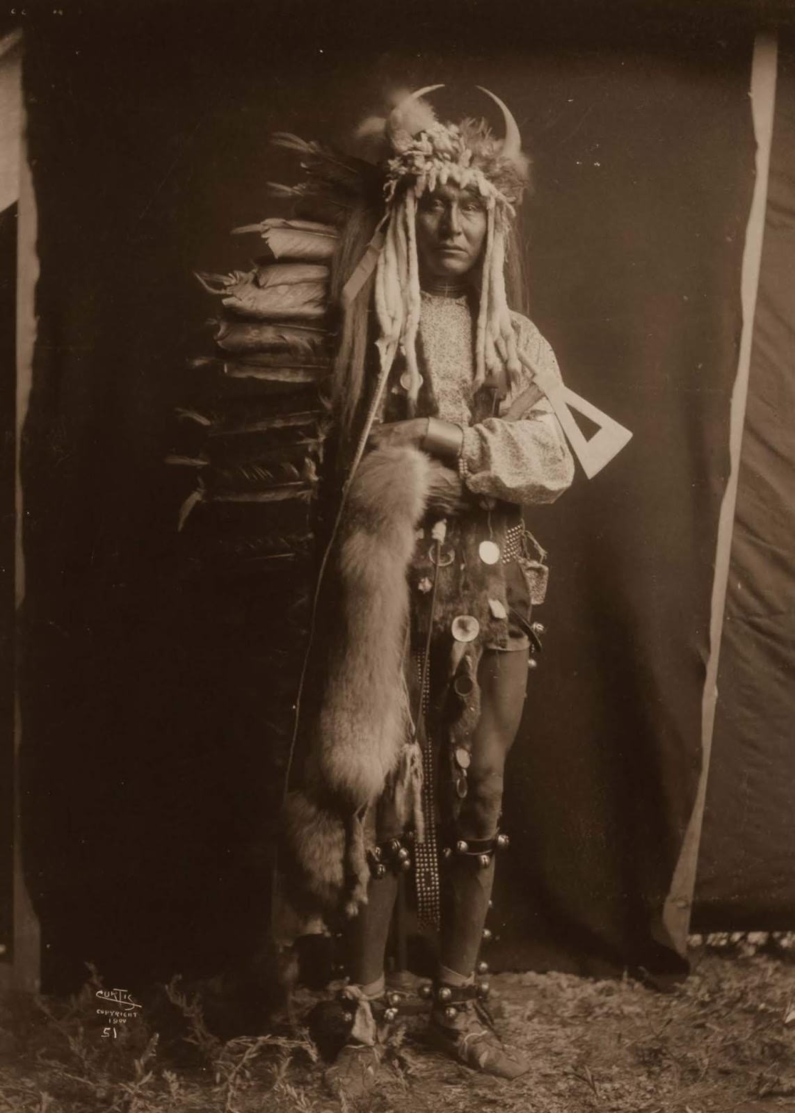 Iron Breast, a Piegan man. 1900.