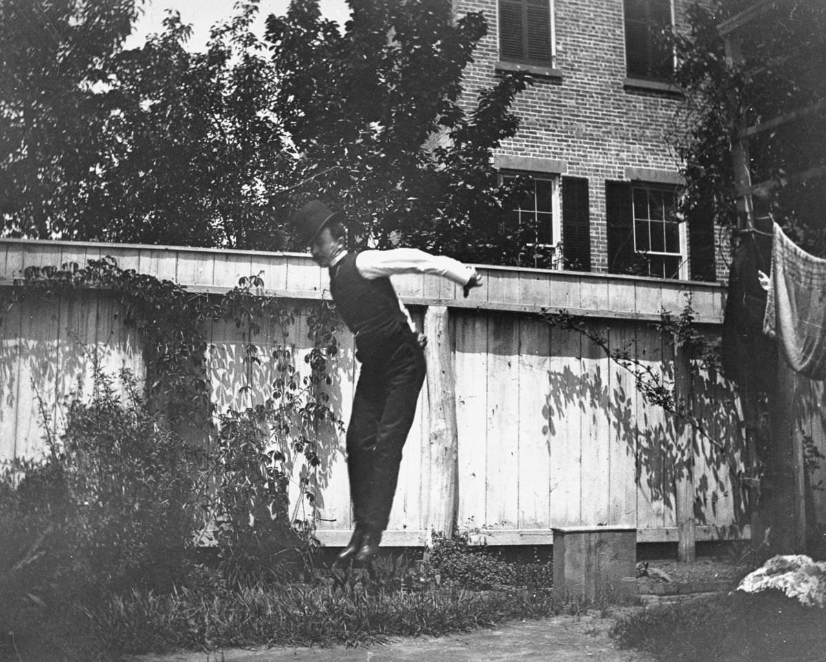 J.M. Cornell jumps in the backyard at 314 Livingston Street.May 28, 1886