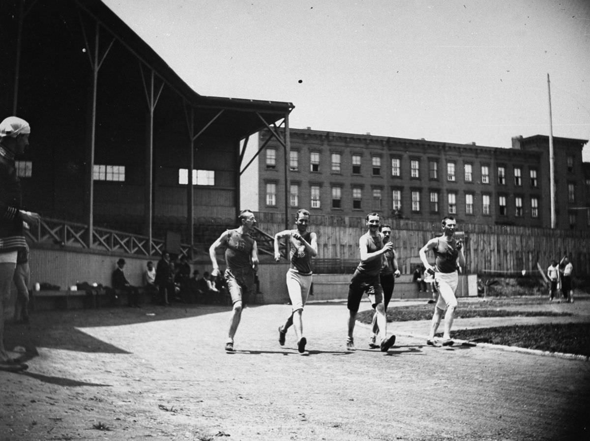 Five men compete in a walking race.June 27, 1886