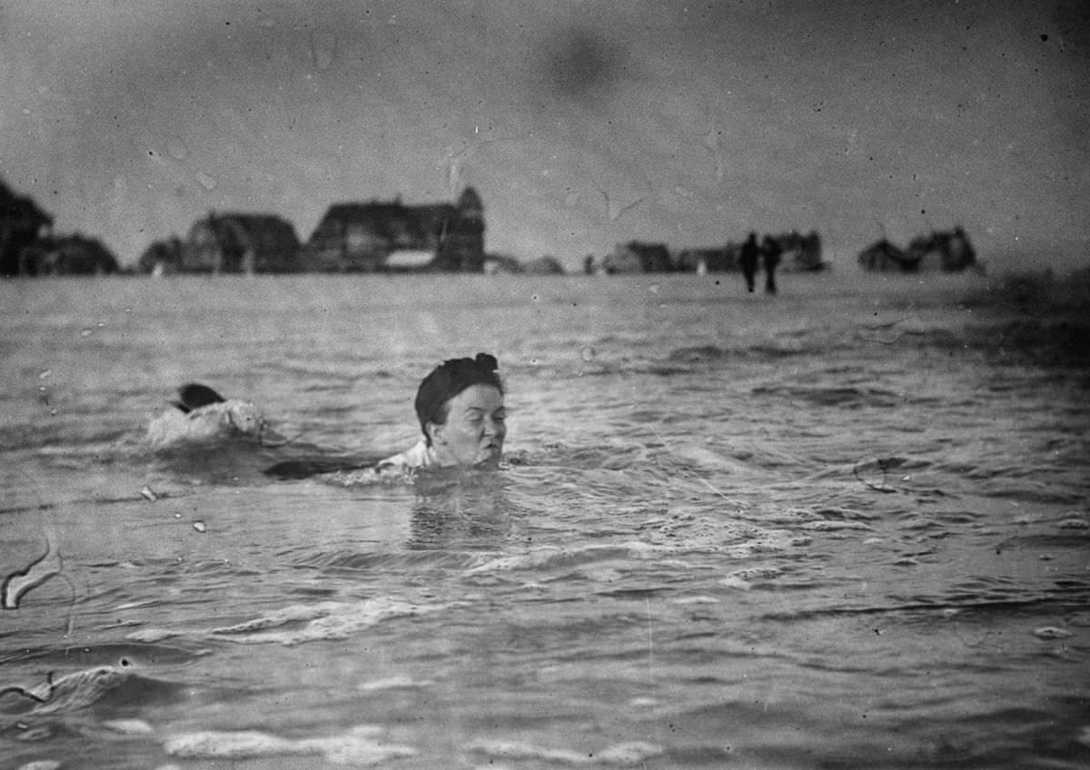 A woman swims at the beach.Sept. 8, 1897