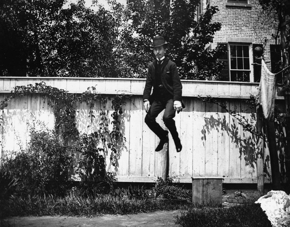 J.M. Cornell jumps in the backyard at 314 Livingston Street.May 28, 1886