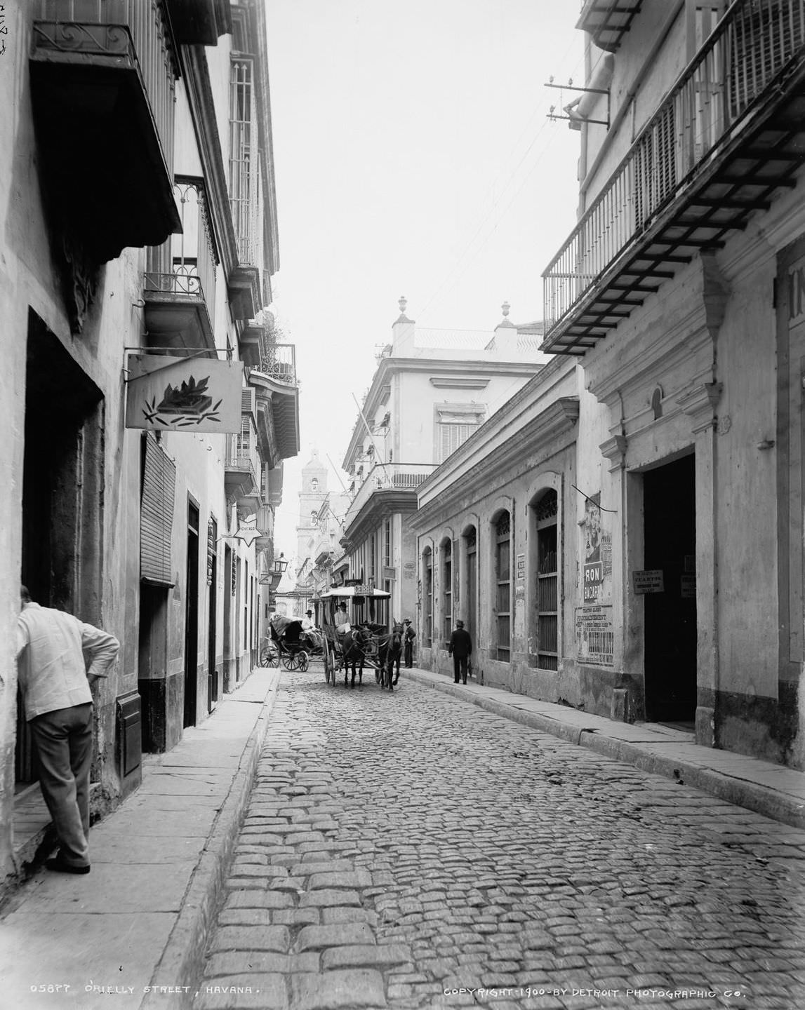 A view from O'Reilly Street, looking down San Ignacio Street toward the Cathedral, Havana, 1900