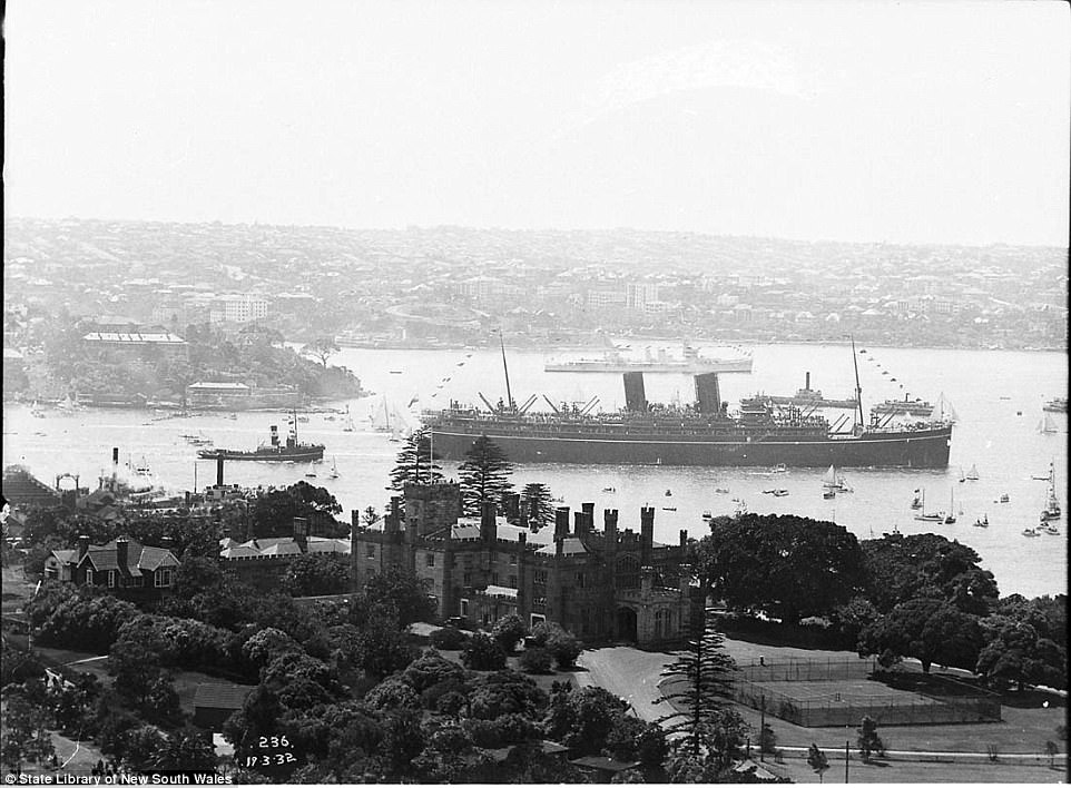 A photograph taken in 1932 overlooking over the Royal Botanic Gardens and the old Government House shows a large passenger ship in Sydney Harbour