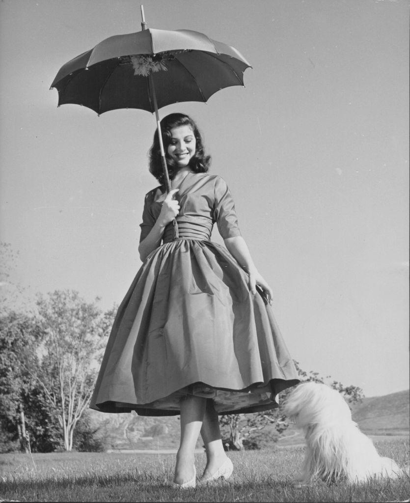 Pier Angeli holding an umbrella, circa 1954