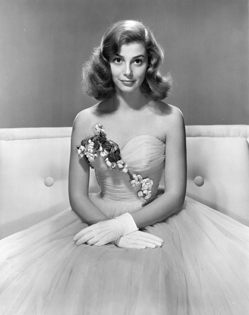 Pier Angeli poses in an evening gown and gloves, circa 1950