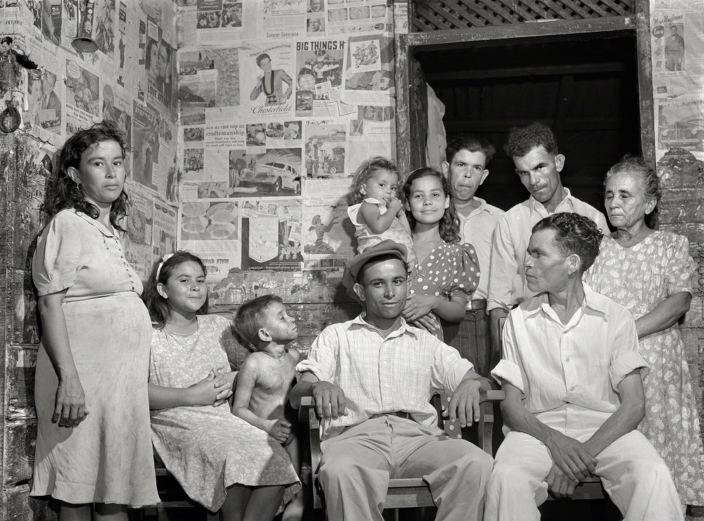 Family of a sugar worker living in one of the company houses behind the mill, Guayanilla, Puerto Rico, January 1942