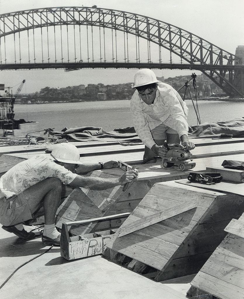 Leading hand carpenter Norm Delmas of Ermington takes levels (left) as apprentic