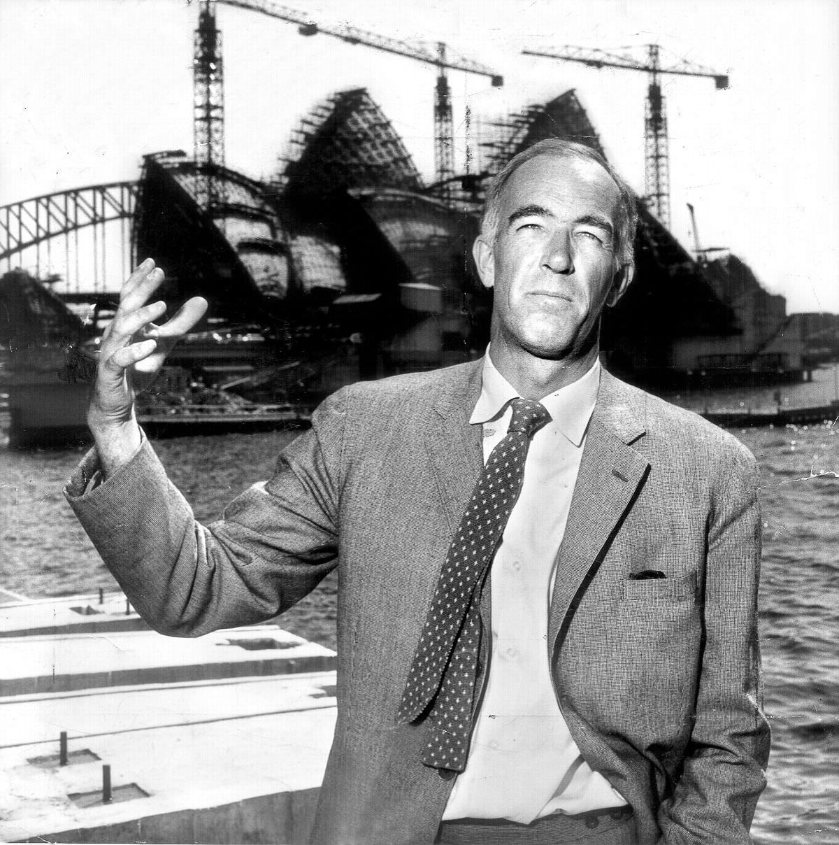 Architect Jørn Utzon in front of the Sydney Opera House, eight years after his designed was selected and six years into construction, 1965