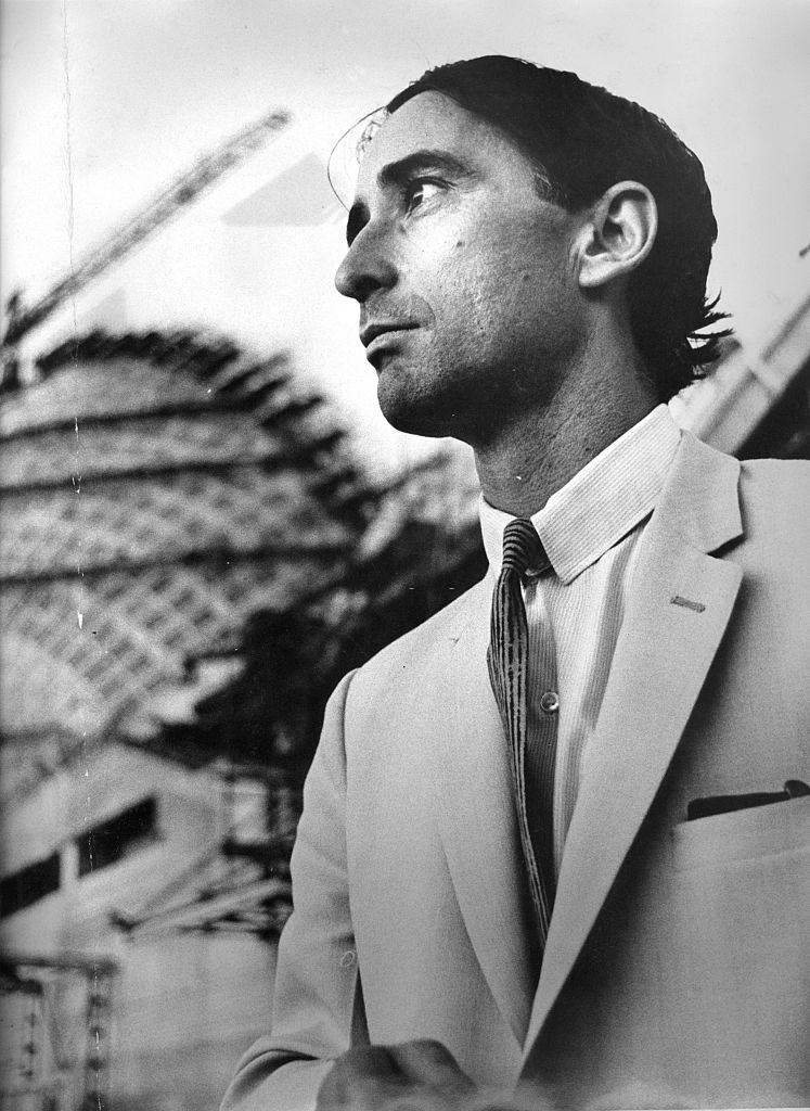 Architect Peter Hall in front of the Sydney Opera House during its construction, 21 April 1966. University of Sydney students armed with posters protest against the architects' appointments for the Sydney Opera House, 20 April 1966.