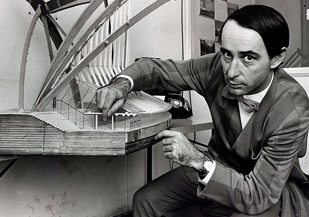 The design-architect of the Sydney Opera House, Peter Hall, with a model of the building, 5 May 1968.