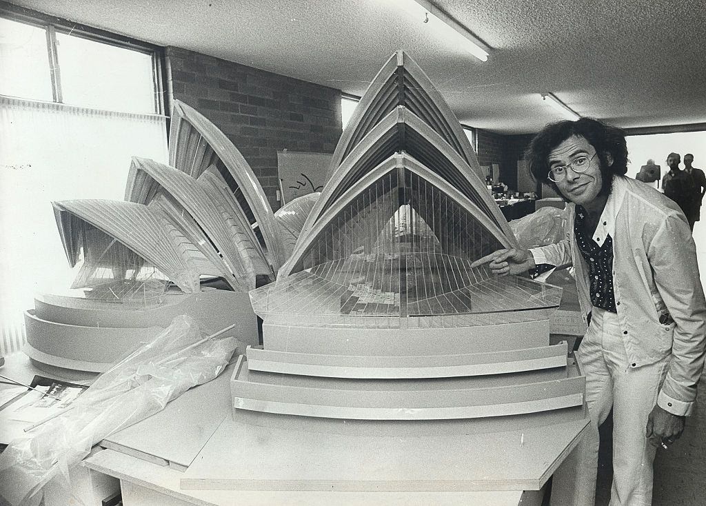 Mr R.Consigli, one of many architects consulting on the building of the Sydney Opera House, is pictured with a model showing the main halls of the Opera House as it will stand in its finished state, December 1969.