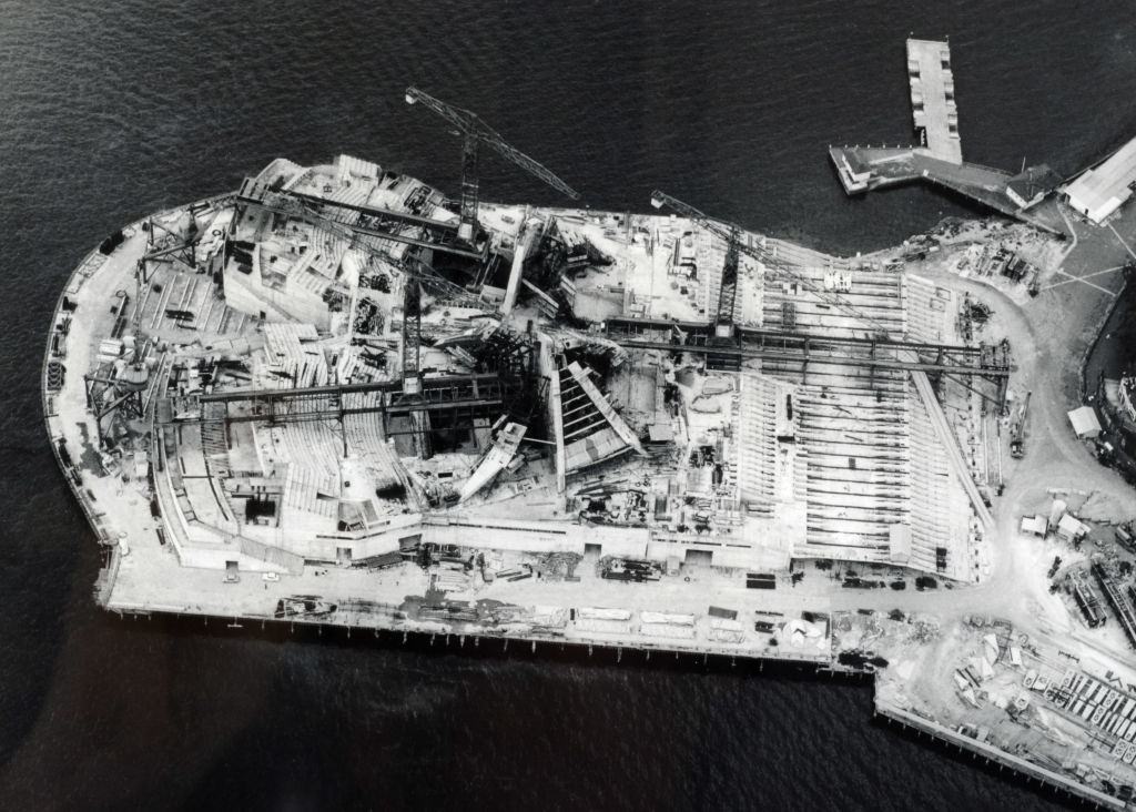 The construction work on the Sydney Opera House as seen from above, An aerial picture looking down on the building work showing the start of the famous shells, 1960