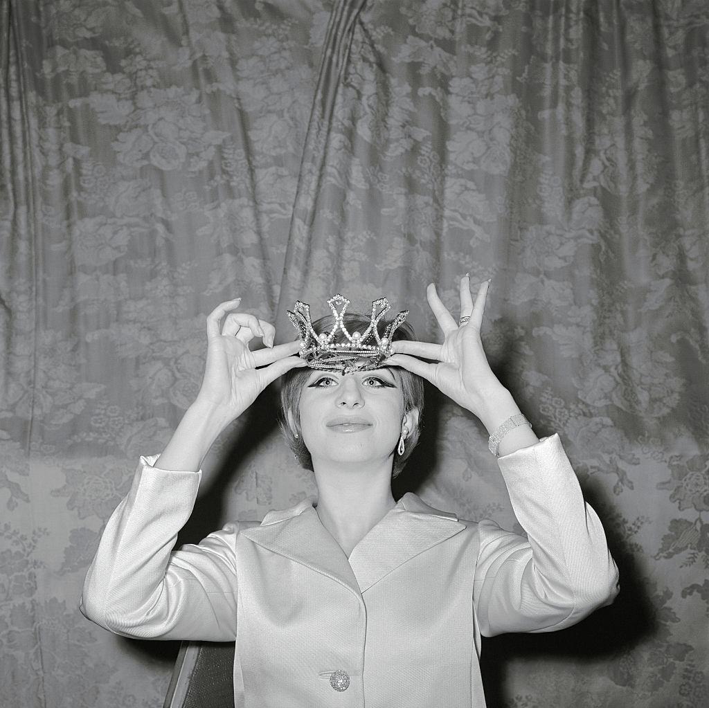 Barbra Streisand, wearing a crown as "Miss Ziegfeld of 1965"