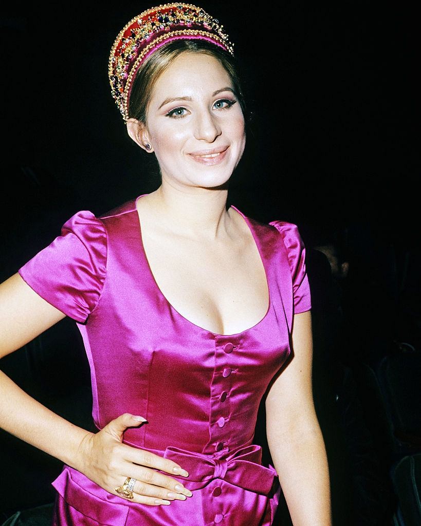 Barbra Streisand in a fuchsia pink silk dress, 1965