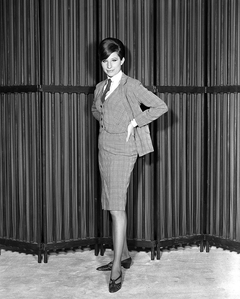 Barbra Streisand, in a three-piece suit, 1965
