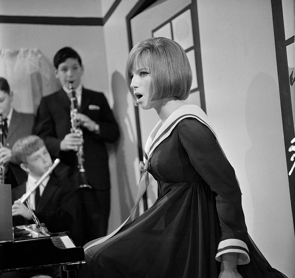 Barbra Streisand sings accompanied by a band of young boys on her 'My Name is Barbra', 1965