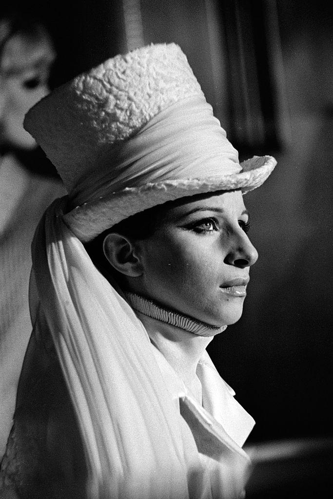 Barbra Streisand wearing a top hat, 1965
