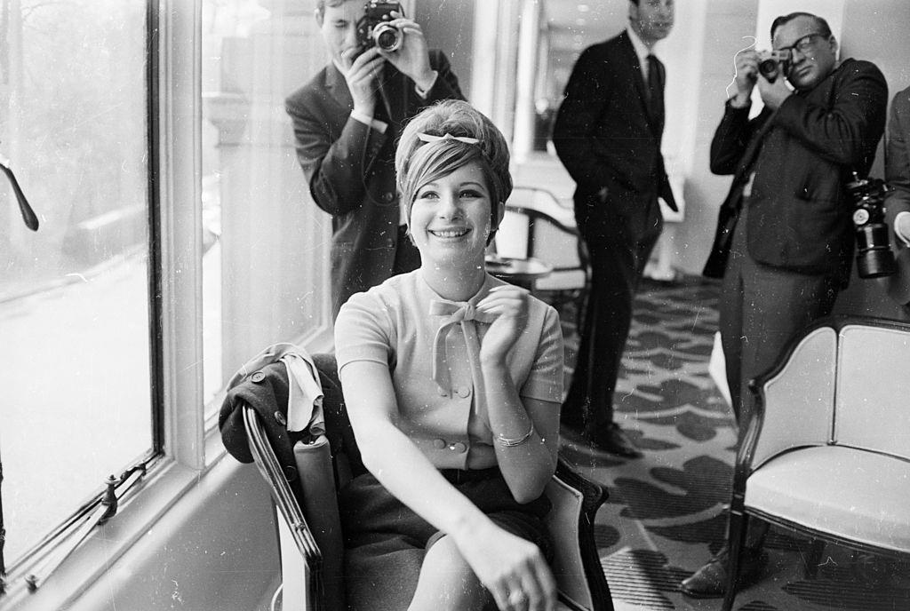 Press photographers taking pictures of Barbra Streisand, 1966