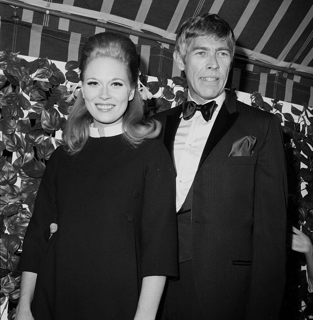 Faye Dunaway with actor James Coburn , 1966