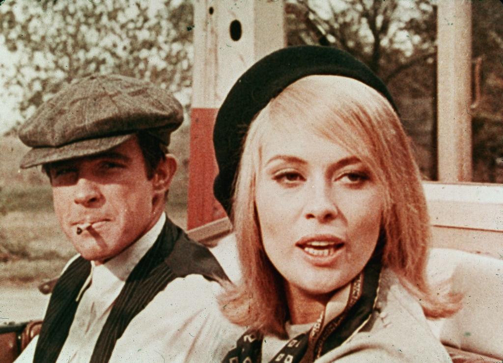 Faye Dunaway with Warren Beatty in a car from the movie 'Bonnie and Clyde', 1967