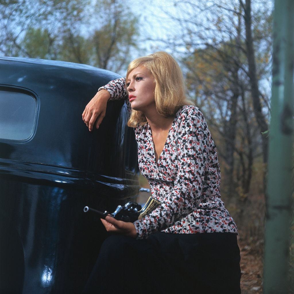 Faye Dunaway holding a revolver, 1967