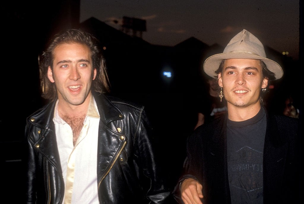 Johnny Depp with Nicolas Cage, 1988