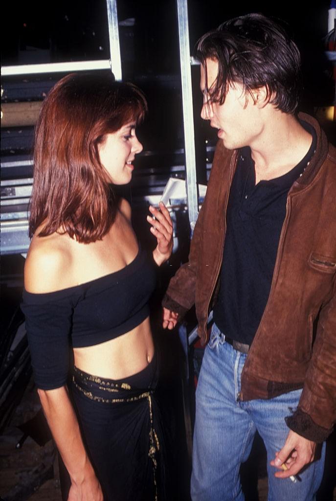 Johnny Depp with an unknown girl, 1989