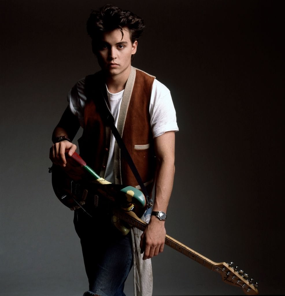 Young Johnny Depp with his guitar in 1987 in New York City
