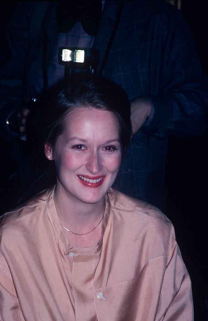 Meryl Streep in a peach dress at an award ceremony, 1970