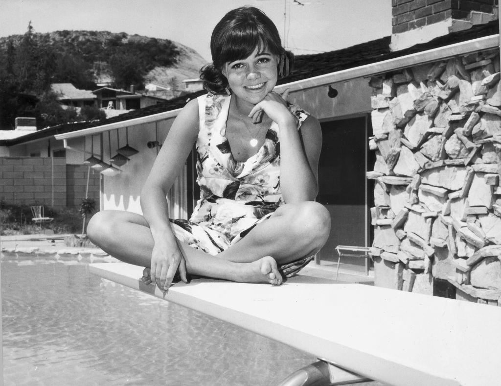 Sally Field, wearing a floral-print outfit, 1965