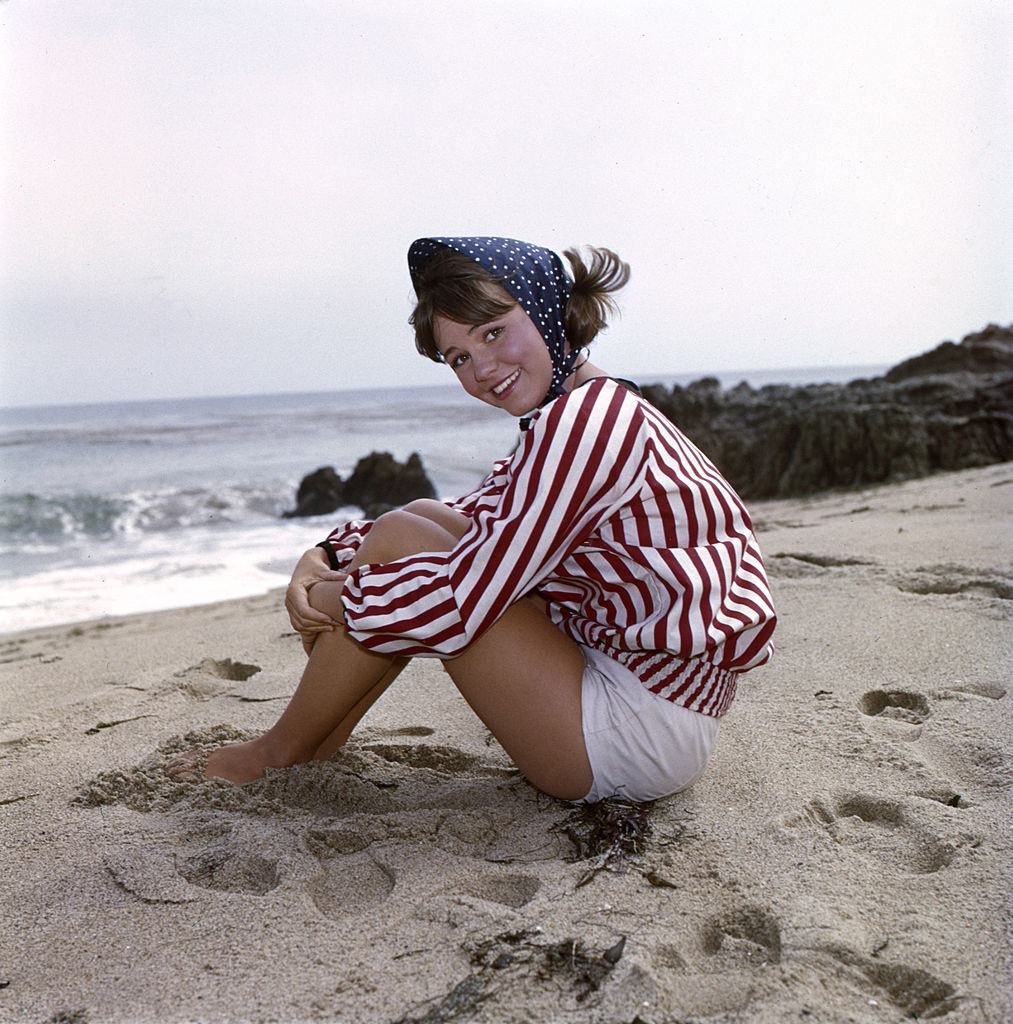 Sally Field enjoying on the beach, 1965