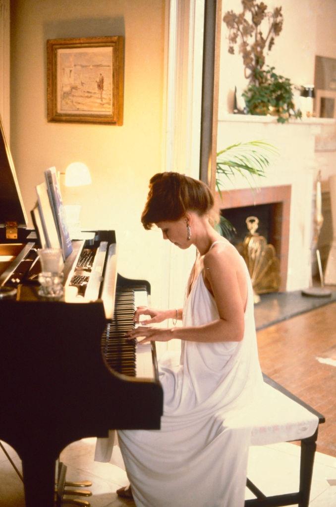 Sally Field playing the piano, 1970s