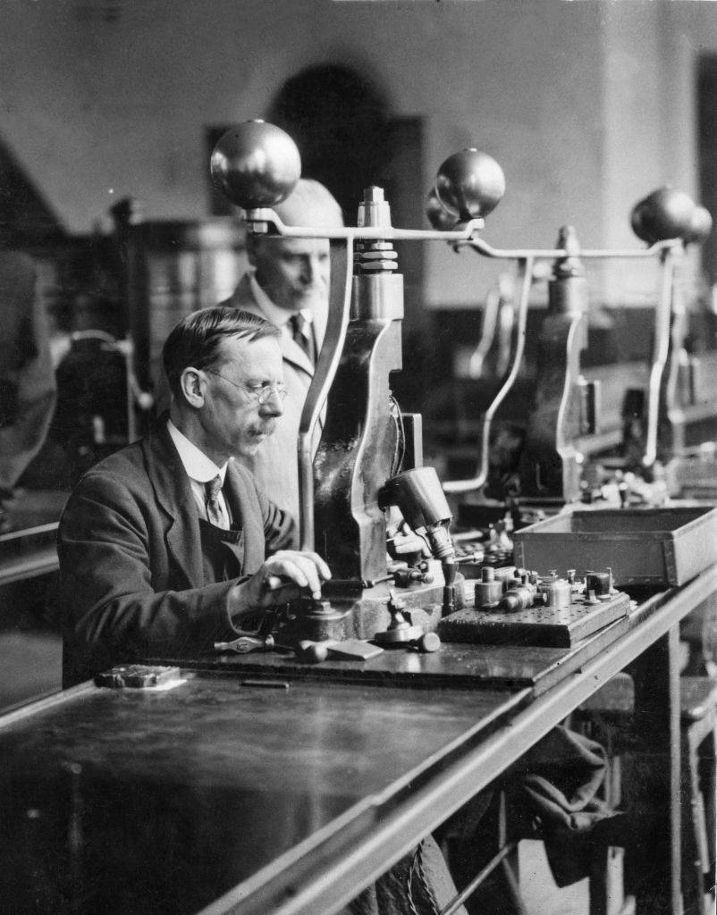 The final process in the hallmarking of gold in Birmingham's Assay Office in Newhall Street, October 1931.