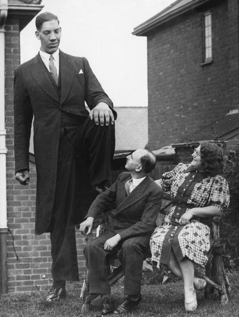Vaino Myllyrinne the world's tallest man who's height is recorded at 8 feet 3 inches is seen here attending the wedding of Pat Collins in Birmingham, 1939.
