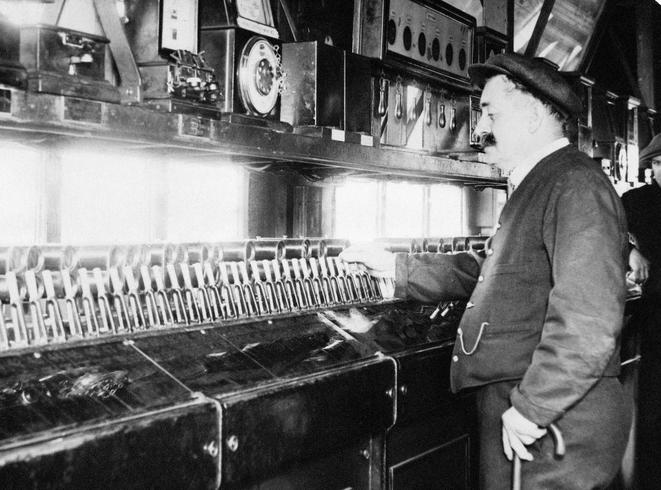 A signalman at work at Snow Hill railway station in Birmingham, June 1932.