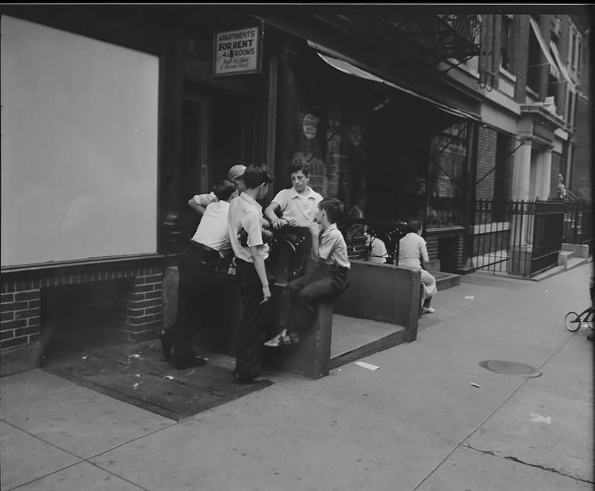 A group of boys on East 62nd (or 63rd) Street