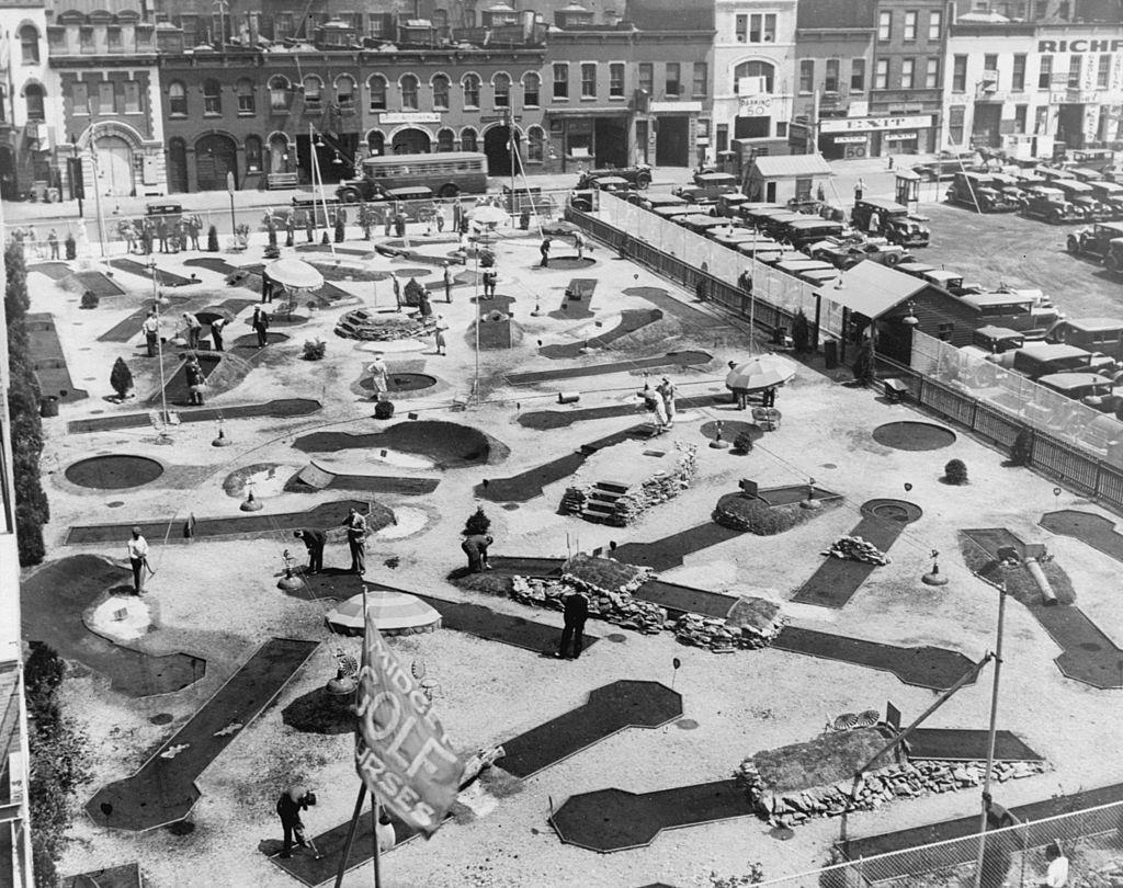 Miniature golf courses in New York City on 50th Street next to Roxy's theatre, 1930s.