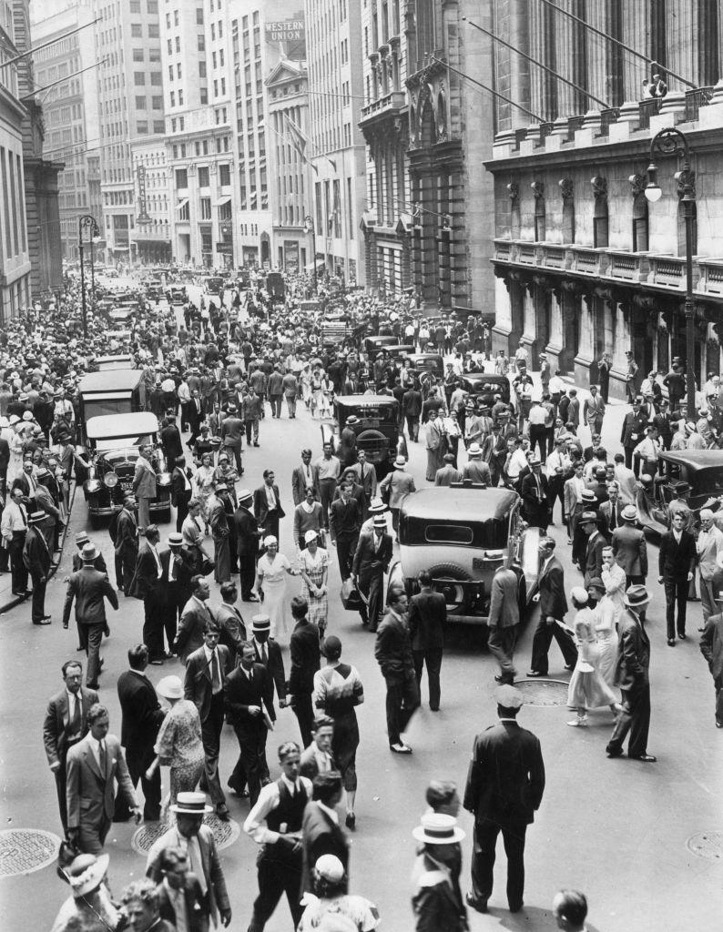 Fluctuations in the New York Stock Exchange are reflected in the mood of Wall Street, 1930s.