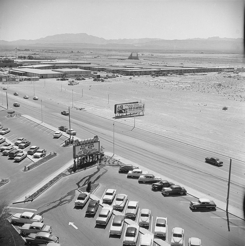 Aerial view over the parking lot of the Rivera Hotel and surrounding desert, Las Vegas, Nevada, 1955.